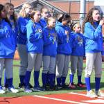 Little League softball player Maddie McCarthy sings the National Anthem with her team, the Diamond Divas. RACHEL CIAMPI, Auburn Reporter