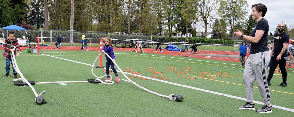Awesome Inc., coach Vera Vinogradova watches Karolina Dundukova, 8, and Elijah Schwenk, 7, do the ropes. RACHEL CIAMPI, Auburn Reporter