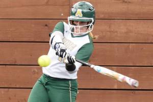 Adams pitches, powers Trojans past Ravens; Auburn grabs share of league title