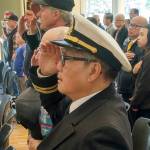 Thao Van Nguyen, a former officer with the South Vietnamese Navy, salutes the flag of his country during Black April ceremonies at Auburns Activities Center at Les Gove Park last Sunday, marking the 44th anniversary of the fall of Saigon on April 30, 1975. ROBERT WHALE, Auburn Reporter