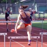 Auburn Mountainviews Addyson Jones races down the final stretch to win the 300-meter hurdles in 50.18 seconds. She also won the 100 hurldes in 17.43. MARK KLAAS, Auburn Reporter