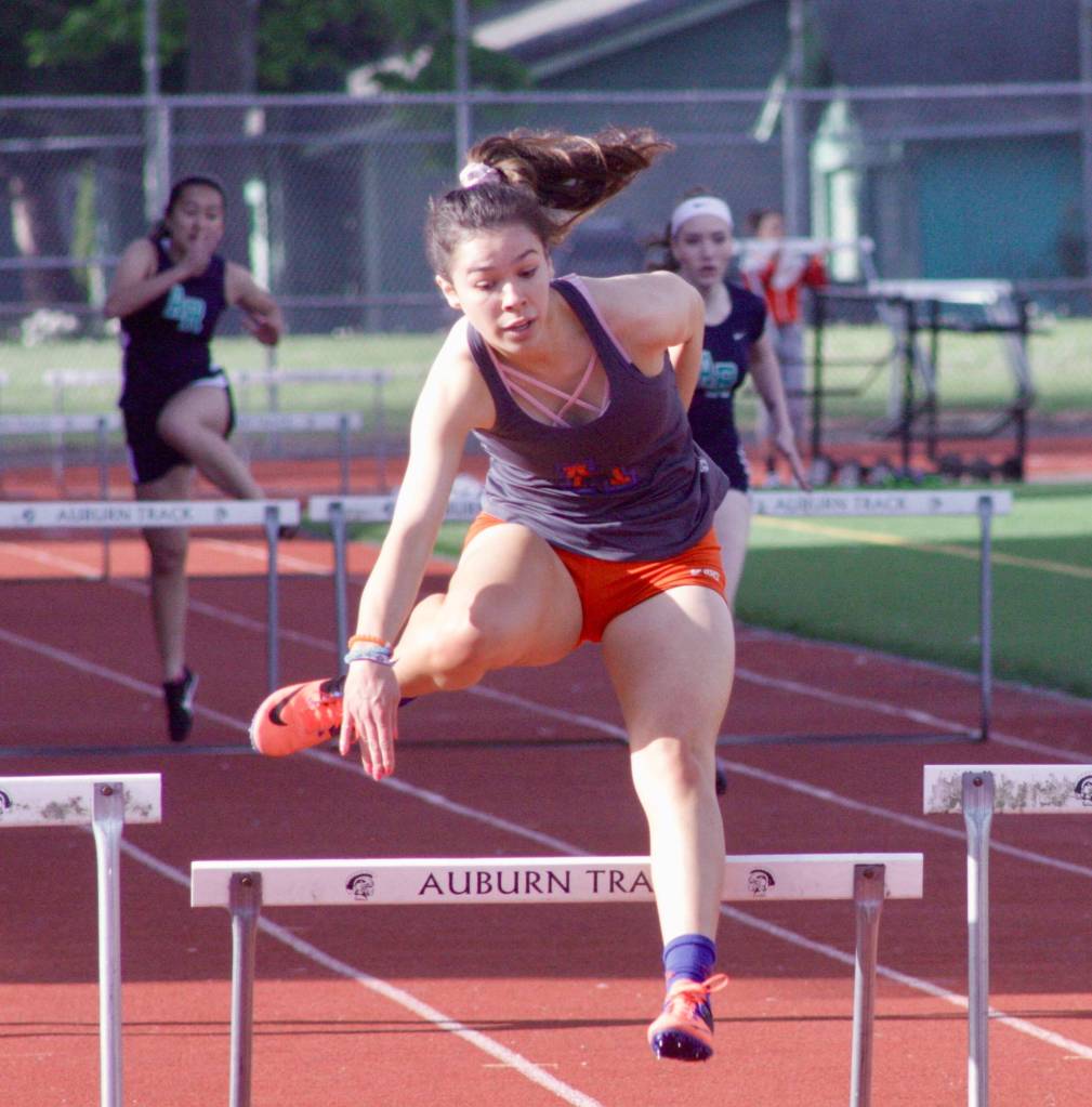 Auburn Mountainviews Addyson Jones races down the final stretch to win the 300-meter hurdles in 50.18 seconds. She also won the 100 hurldes in 17.43. MARK KLAAS, Auburn Reporter