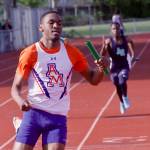 Chris Penn anchors Auburn Mountainviews 400-meter relay to victory at the Auburn All-City track and field finals on Thursday. The Lions won in 43.24 seconds, the fifth-fastest time among 4A schools this year. MARK KLAAS, Auburn Reporter