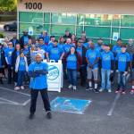 Michael Jackson, development director of Nexus Youth & Families, foreground, and volunteers performed chores at its Auburn center during Comcast Cares Day. COURTESY PHOTO, Comcast