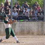 Auburns Lynetti Aumua drills a fifth-inning grand slam home run in the Trojans 13-2 NPSL tournament win against Kennedy Catholic at the Kent Service Club Ballfields on Friday. RACHEL CIAMPI, Auburn Reporter