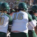 Teammates celebrate Auburns Lynetti Aumua grand slam home run against Kennedy Catholic. RACHEL CIAMPI, Auburn Reporter