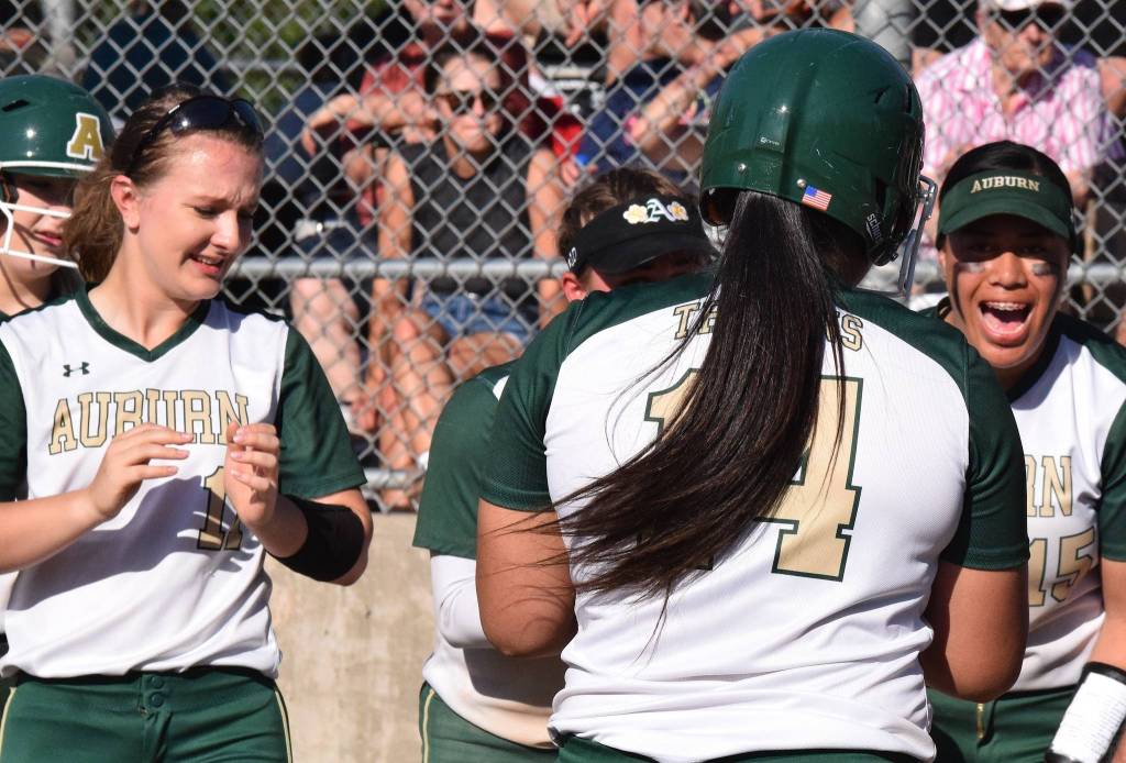 Teammates celebrate one of Charity Sevaaetasis two home runs against Kennedy Catholic. RACHEL CIAMPI, Auburn Reporter