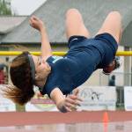 Auburn Riversides Alaya Hill soars in the high jump at the 4A WCD meet. Hill won the district title with a leap of 5 feet, 2 inches. RACHEL CIAMPI, Auburn Reporter