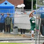 Auburns Omar Young fought the elements but secured second place in the discus with a school-record toss in the 4A final last Saturday. RACHEL CIAMPI, Auburn Reporter