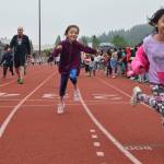 Illako Elementary School Assistant Principal James House joins students for the traditional Mile Run on the Auburn Riverside High School oval last Friday. RACHEL CIAMPI, Auburn Reporter