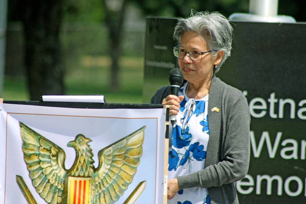 Lan Phan Jones, co-president of the American-Vietnamese War Memorial Alliance, addresses the gathering. MARK KLAAS, Auburn Reporter
