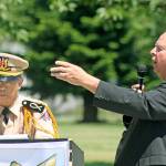 Former Auburn Mayor Pete Lewis welcomes and thanks those attending the gathering with the help of Khanh Le, an interpreter with the Thu-Duc Academy Association. MARK KLAAS, Auburn Reporter