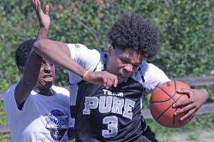 The outdoor courts at the accesso ShoWare Center come to life with 3-on-3 boys and girls basketball action in several divisions July 13 and 14. MARK KLAAS, Kent Reporter