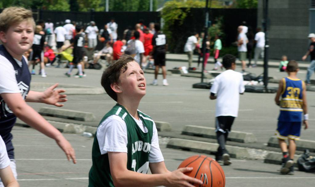 Auburns Jacob Gooden drives the basket during seventh-grade boys division play. MARK KLAAS, Kent Reporter