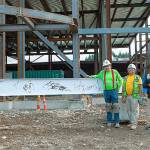 Jaison Elkins, Muckleshoot Tribal Council chair, far left; Jessica Garcia-Jones, Muckleshoot Tribal Council member, left; and Donny Stevenson, Muckleshoot Tribal Council vice-chair, far right, are joined by two tribal construction workers for the historic event. COURTESY PHOTO, Muckleshoot Tribe