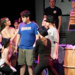 Thronged by cast members, Pippin (Rodger Skaggs) contemplates the meaning of his life in Auburn Community Teen Players production of Pippin, which opens Friday at the Auburn Avenue Theater. COURTESY PHOTO, Jim Kleinbeck