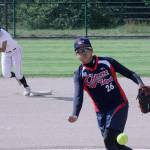 Chiu An-Ju, of the Chinese Taipei Olympic womens team, delivers a pitch as Acer alum Destiny Conerly prepares to advance from second base during their exhibition softball game at the Service Club Community Park Ballfields in Kent on July 18. Conerly led off the first inning with a double but was left stranded. MARK KLAAS, Kent Reporter