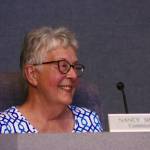 King County Landmarks Commissioner Nancy Simpson smiles after the panel granted the city of Kent historic landmark designation for three Apollo lunar rovers during a public hearing at Kent City Hall on Thursday. The rovers were manufactured at Boeings Space Center in Kent during the Apollo program era. MARK KLAAS, Kent Reporter