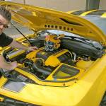 Kents Scott Hanline shows off Bumblebee, his Chevrolet Camaro, named after a Transformer character, outside the Kent Commons during CybFestNW 2019 last Saturday. MARK KLAAS, Kent Reporter