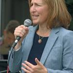 U.S. Rep. Kim Schrier, D-Wash., speaks to a gathering outside HealthPoint Auburn North on Thursday afternoon. The Congresswoman talked about the importance of childhood immunizations. MARK KLAAS, Auburn Reporter
