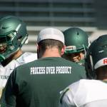 Auburn coach Aaron Chantler goes through his practice itinerary with his players Monday. MARK KLAAS, Auburn Reporter