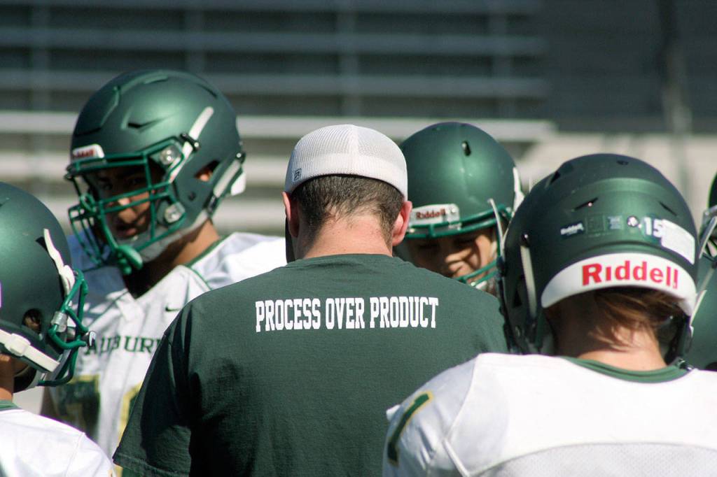 Auburn coach Aaron Chantler goes through his practice itinerary with his players Monday. MARK KLAAS, Auburn Reporter