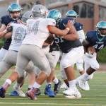 The Ravens Jayden Solis follows his blockers in a search for daylight against the Lions. RACHEL CIAMPI, Auburn Reporter