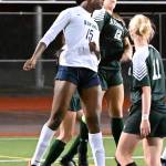 Auburn Riversides Stephanie Igwala, left and Auburns Shelby Clayton vie for a ball during NPSL Olympic girls soccer play Thursday night. RACHEL CIAMPI, Auburn Reporter