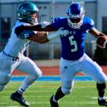 Auburn Riversides Arthur Tauiliili pursues Federal Way running back Jaylen Bogan during first-half play Friday. OLIVIA SULLIVAN, Federal Way Mirror