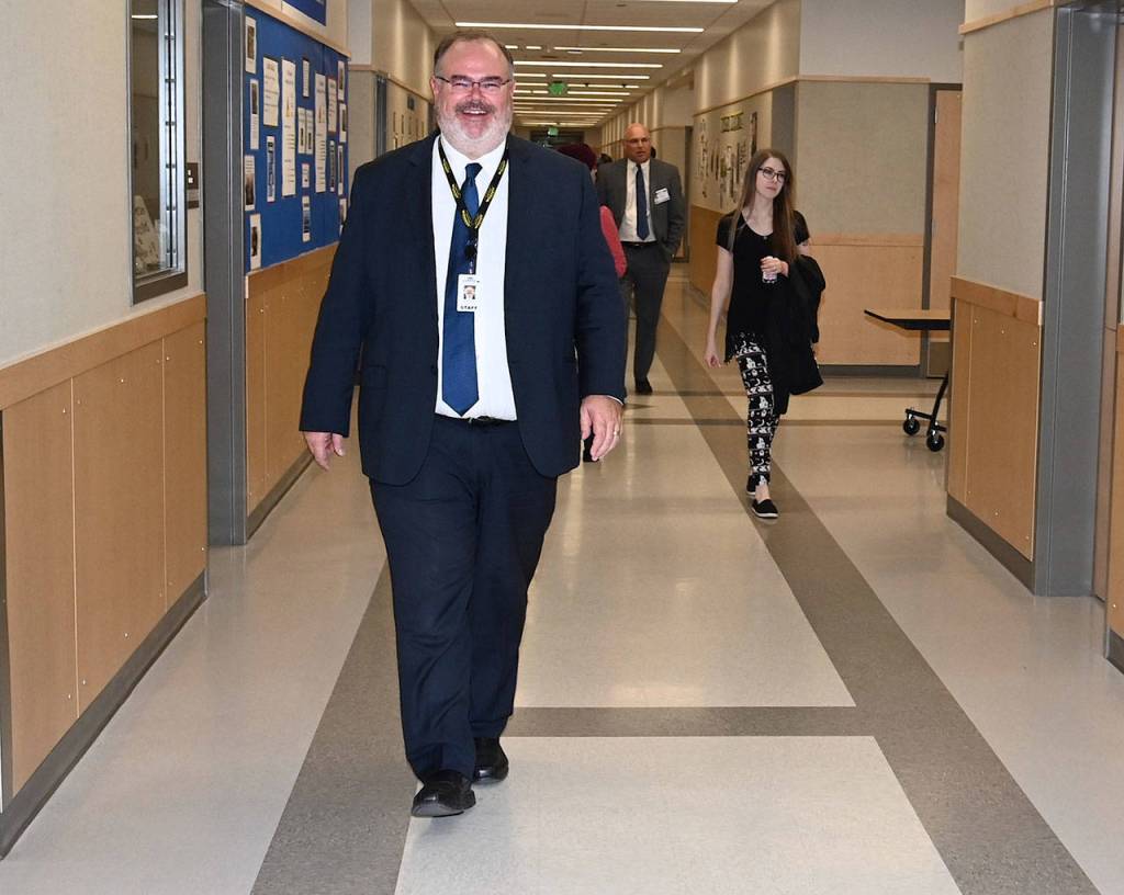 Auburn School District Superintendent Alan Spicciati walks the halls of the new Olympic Middle School. RACHEL CIAMPI, Auburn Reporter