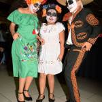 Jocelyn, Breanna, and Mauricio Ibarra dance to the music during last years festival. RACHEL CIAMPI, Auburn Reporter