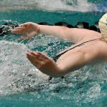 Kyra Brandt swims the butterfly leg of Auburn Riversides 200-yard medley relay at the All-City girls swim meet at the Auburn School District Pool on Monday night. The Ravens took the race and the team title. RACHEL CIAMPI, Auburn Reporter