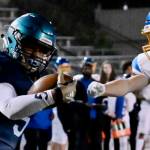 Ravens roll to win; Trojans tumble to Gators