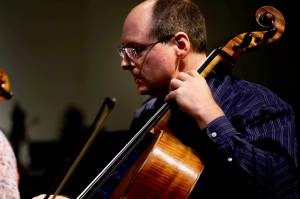 Brian Wharton, Auburn Symphony Orchestras principal cellist, rehearses. Wharton joins three other cellists from the orchestra for two chamber series concerts in November. COURTESY PHOTO, ASO