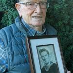 Then and now: Auburns Mike Lisle served honorably in the Navy as a young officer aboard different ships for different tasks. At 96, the war veteran enjoys the quiet life with family and friends. MARK KLAAS, Auburn Reporter