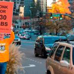 Political activist Tim Eyman campaigns for Initiative 976 on Nov. 5 in downtown Bellevue. The initiative promised $30 car tabs while functionally eliminating the ability of agencies like Sound Transit to raise taxes for its projects. Photo by Aaron Kunkler
