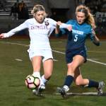 The Ravens Peyton Miller, right, and the Hornets Ren Olson vie for the ball. RACHEL CIAMPI, Auburn Reporter