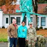 From left, Private 2nd Class Hunter White, PV2 April Talaiga and Staff Sgt. Marilyn Gerhardt stand with the Minuteman statue at Camp Murray on Nov. 17. The couple joined the Guard together on Oct. 30. COURTESY PHOTO, U.S. National Guard, Joseph Siemandel