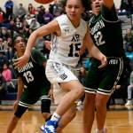 Auburns Maleek Arington, right, and Auburn Riversides Isiah Gulchuk reach for the ball during NPSL Olympic play last Friday night on the Ravens court. RACHEL CIAMPI, Auburn Reporter