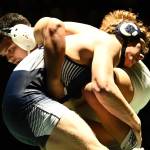 Auburn Riversides Christian Pedro, bottom and right, tangles with Auburns Uriel Parra during their 220-pound match on Jan. 23. Pedro won by fall at four minutes, 59 seconds. RACHEL CIAMPI, Auburn Reporter