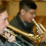 Auburn Riversides Riley Nutter (trombone), left, and Jose De la Cruz (trumpet) practice their music. The two student musicians will join the schools large contingent bound for New York Citys Carnegie Hall and the National Band & Orchestra Festival on April 8-11. MARK KLAAS, Auburn Reporter
