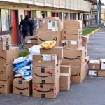 Amazon workers on Tuesday deliver donated supplies to a King County owned and former motel in Kent, now a temporary housing facility for patients in quarantine, isolation and recovery due to COVID-19. COURTESY PHOTO, King County
