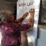 An Auburn resident communicating what she wants the future Arts and Culture center to be at a public meeting at the start of the planning process. Robert Whale/Auburn Reporter