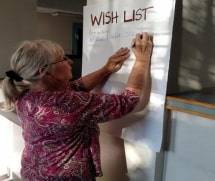 An Auburn resident communicating what she wants the future Arts and Culture center to be at a public meeting at the start of the planning process. Robert Whale/Auburn Reporter