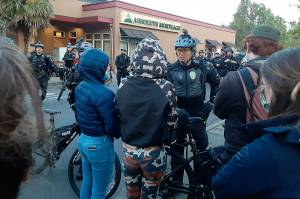 Protesters confront Auburn police on June 2, 2020, in downtown Auburn. Photo by Robert Whale/Auburn Reporter