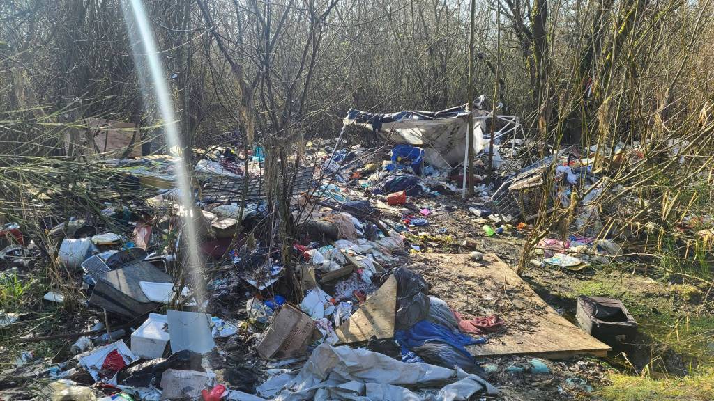 Garbage covers the ground at a homeless encampment off of West Valley Highway near 15th Street Northwest. Courtesy Photo, City of Auburn.