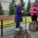 Joyce Peloza and Auburn Mayor Nancy Backus speak to the crowd Sunday, June 6, after the unveiling of a bench in honor of Bill Peloza. (Photo courtesy of city of Auburn)