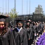 West Auburn High graduates line up to accept their diplomas during graduation ceremonies Saturday afternoon. Courtesy photo.