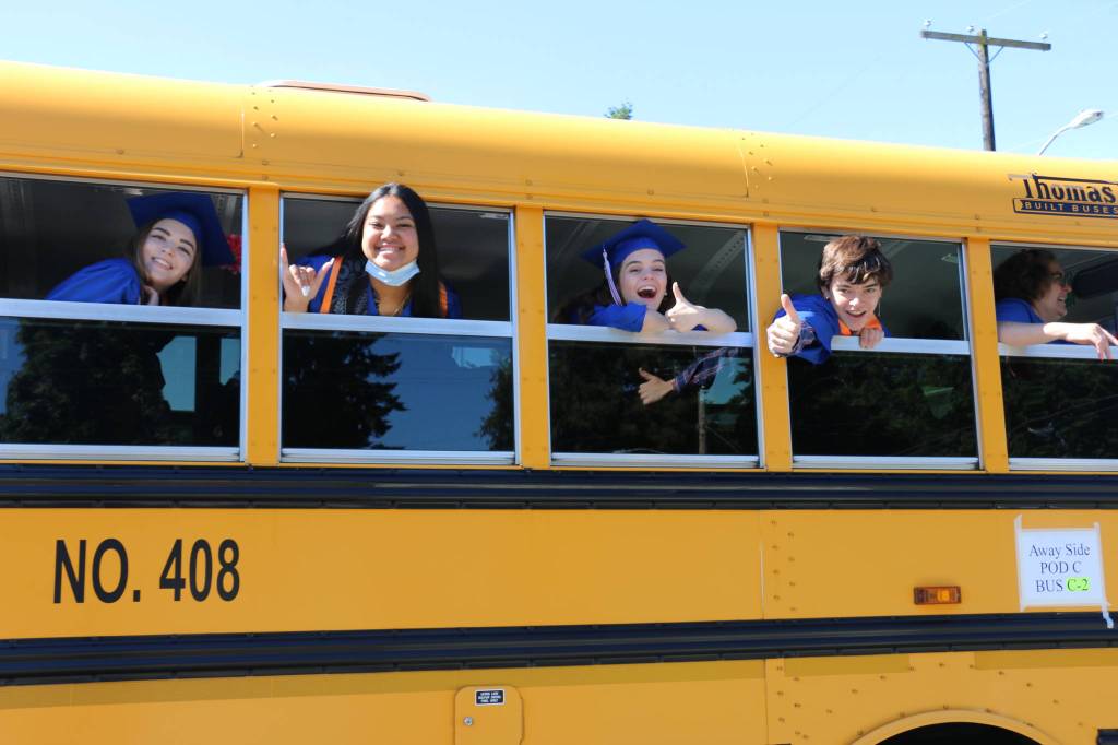 Auburn Mountainview High School graduates are all smiles on the taking them to their graduation ceremonies Saturday afternoon. Courtesy photo.