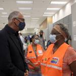 Gov. Inslee (left) meets with Auburn Vaccine Clinic staff member (right) on Tuesday, June 22, 2021. Inslee visited the clinic to promote vaccinations in lower King County. Photo by Henry Stewart-Wood/Auburn Reporter
